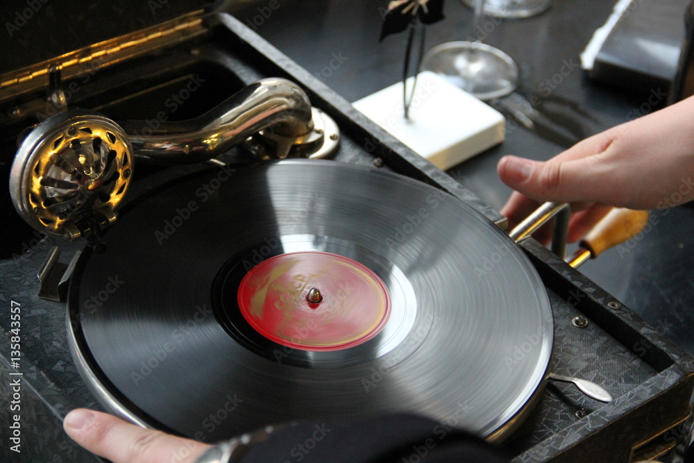 plate and old gramophone/ an old gramophone record inserted plate and old gramophone/ an old gramophone record inserted