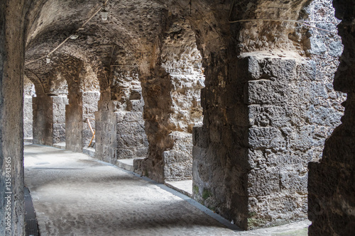 Remains of the Roman amphitheatre in the historic centre of Cata photo