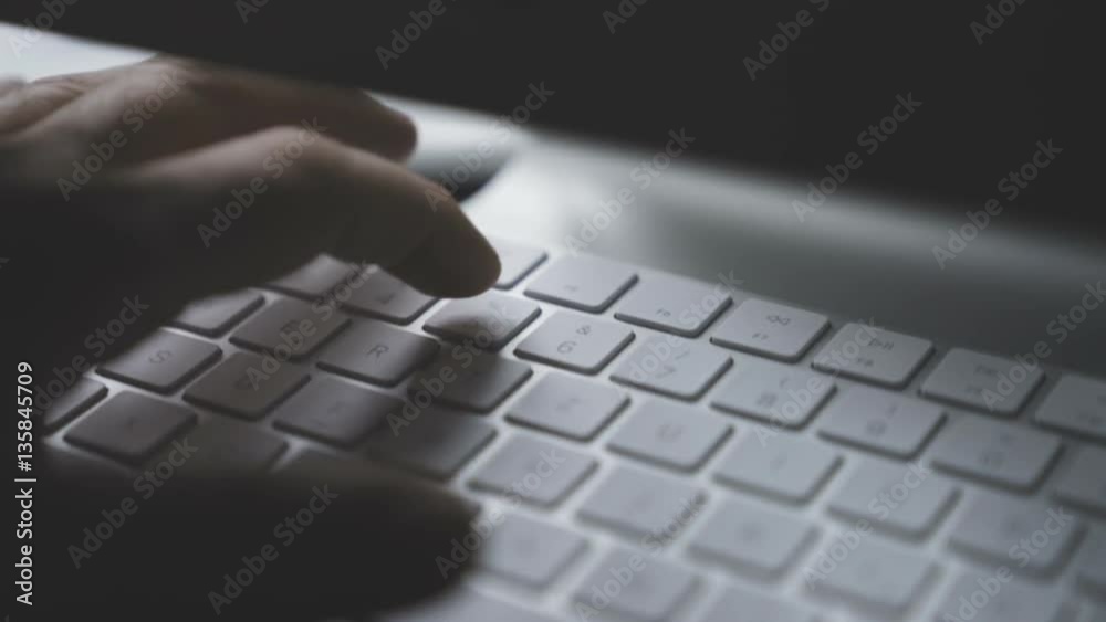 Hands typing on computer keyboard - close-up Hands typing on computer keyboard - close-up