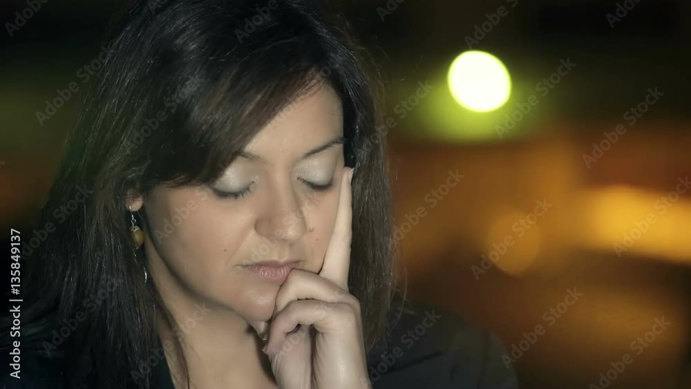 sophisticated woman thinks intensively in the street sophisticated woman thinks intensively in the street