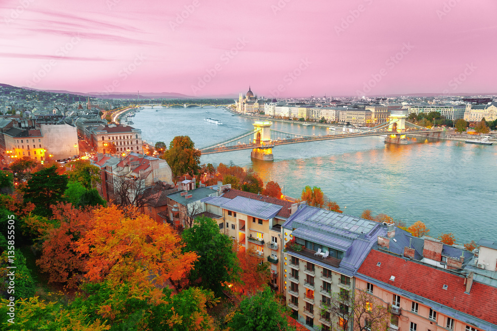 Mesmerizing aerial view of Budapest city center and bridge over the Danube river delta. Sunset scenery. Hungary, Europe. Budapest - one of most popular travel destination in Europe for people in love.