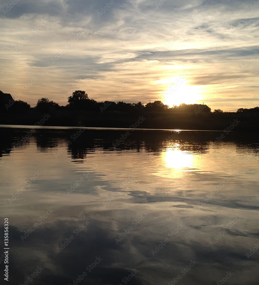 sun rises and reflects