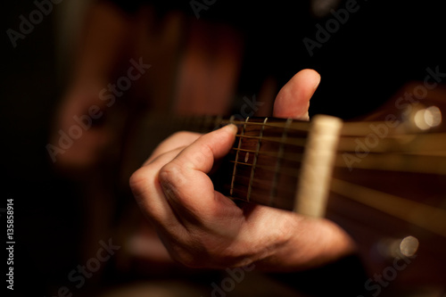  Close-up of men playing acoustic guitar