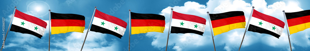 Syria flag with Germany flag, 3D rendering Syria flag with Germany flag, 3D rendering
