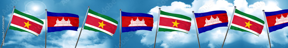 Suriname flag with Cambodia flag, 3D rendering Suriname flag with Cambodia flag, 3D rendering