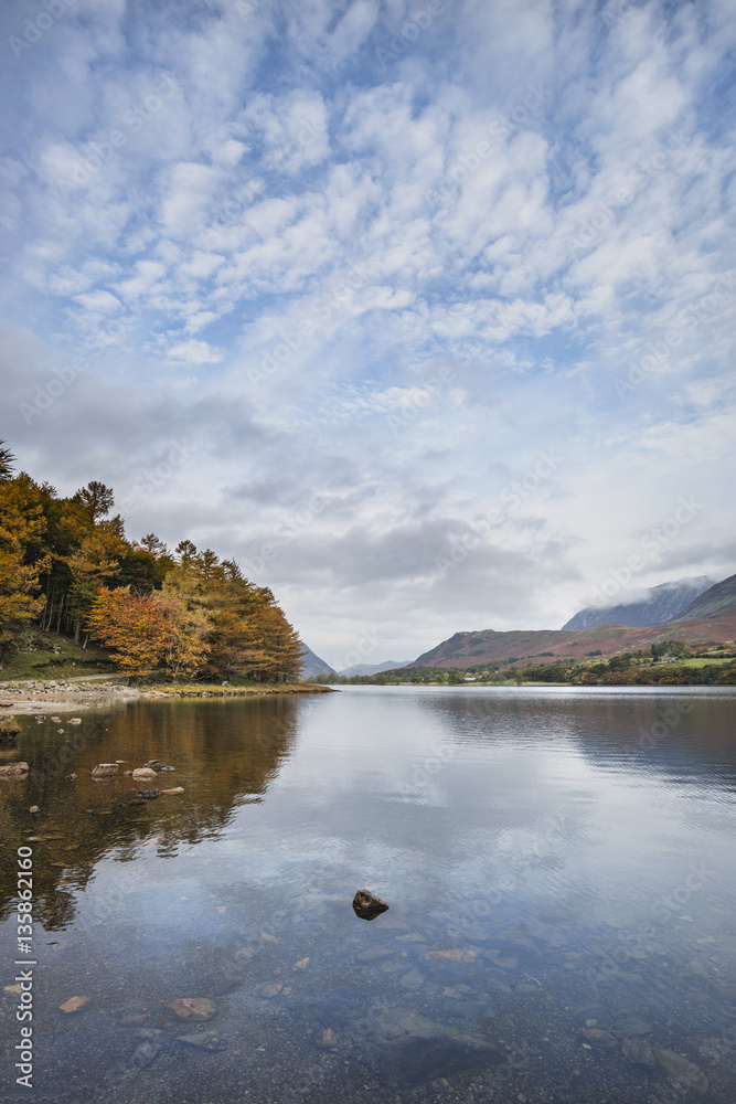Beautiful Autumn Fall landscape image of Lake Buttermere in Lake