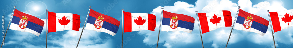 Serbia flag with Canada flag, 3D rendering Serbia flag with Canada flag, 3D rendering
