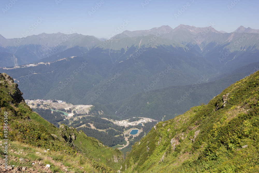 Fototapeta premium The view of the summer mountains in the vicinity of the ski resort Rosa Khutor. Russia