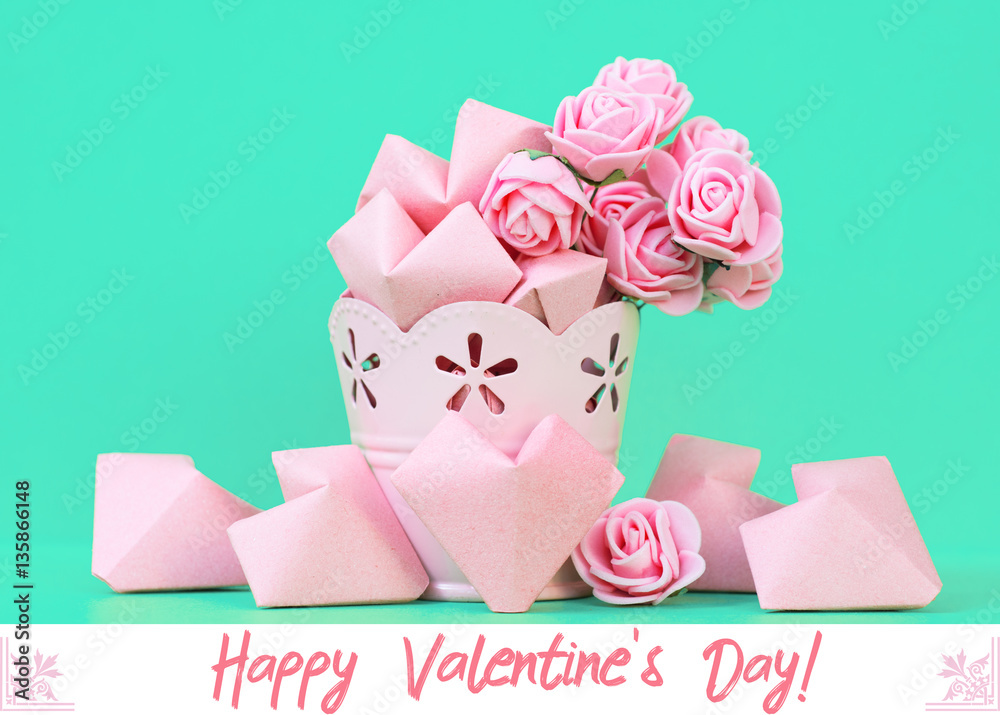 pink roses and paper hearts on a color background. space for text, Happy Valentine's Day card 