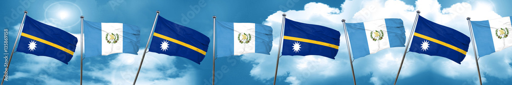 Nauru flag with Guatemala flag, 3D rendering Nauru flag with Guatemala flag, 3D rendering