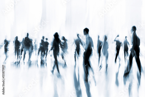 group of people in the lobby business center and blue tonality