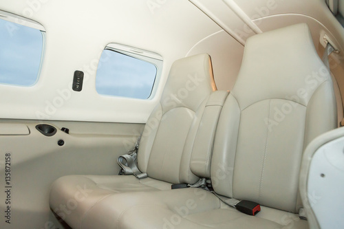 Interior single piston aircraft. Small private aircraft interior and dashboard. matrix