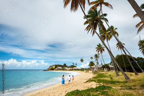 Mother and kids at tropical beach