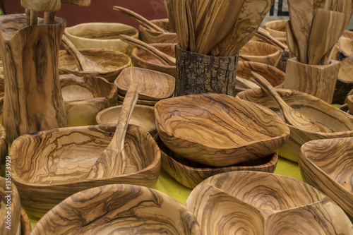 Salad bowls, Kitchen utensils made of wood, spoons, forks, spatu photo