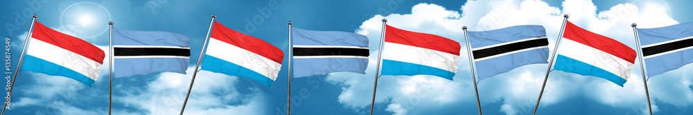 Luxembourg flag with Botswana flag, 3D rendering Luxembourg flag with Botswana flag, 3D rendering