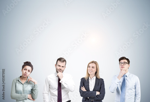 Two men and two women brainstorming