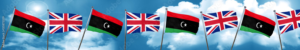 Libya flag with Great Britain flag, 3D rendering Libya flag with Great Britain flag, 3D rendering