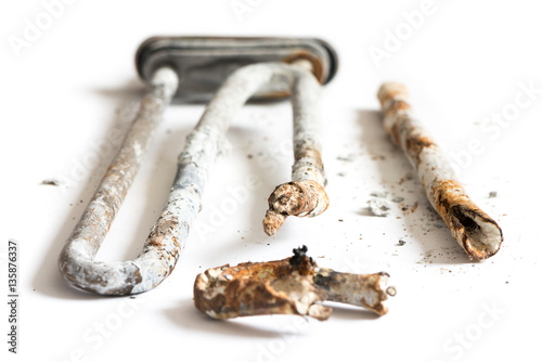 Wallpaper Mural Damaged Heating Element of the Washing Machine on White Background. Torontodigital.ca