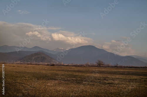 Snow covered mountain landscape, Cloudy landscape of mounatins and fields at winter time. Caucasus, Azerbaijan, Gakh Sheki Zagatala