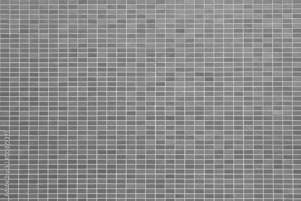 Grey stone tile wall semaless background and pattern