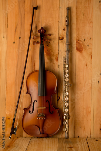 violin and flute on wood. background,still life © ittipol