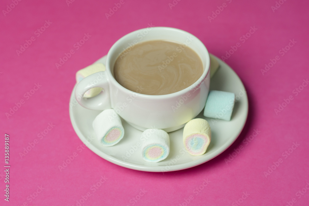 hot chocolate with marshmallows in a ceramic cup on pink paper b hot chocolate with marshmallows in a ceramic cup on pink paper b