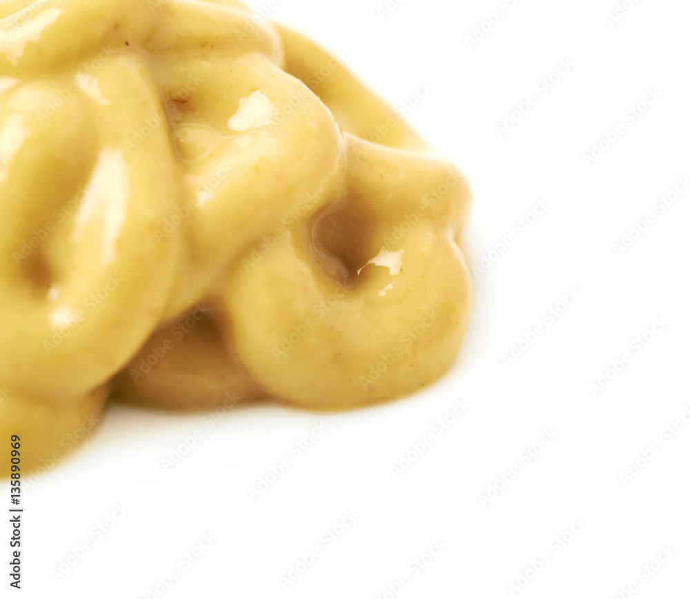 Splash of a mustard souce isolated Splash of a mustard souce isolated