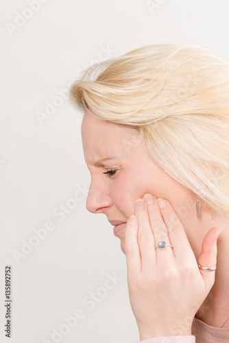 Profile Shot of Lady with Toothache in Pain Copy Space