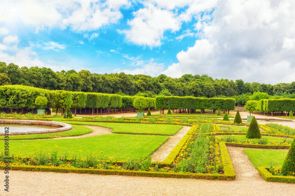 Grand Trianon gardens is famous French-style gardens “filled w