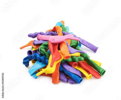 Pile of multiple unblown balloons isolated