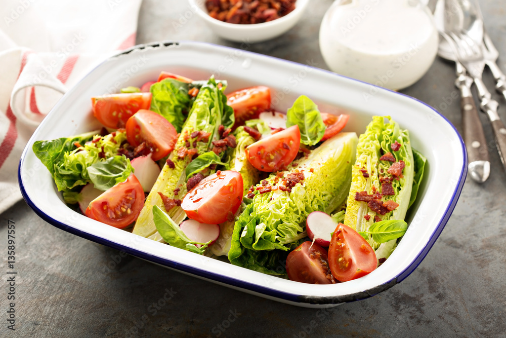 Wedge salad with baby lettuce and tomatoes Wedge salad with baby lettuce and tomatoes