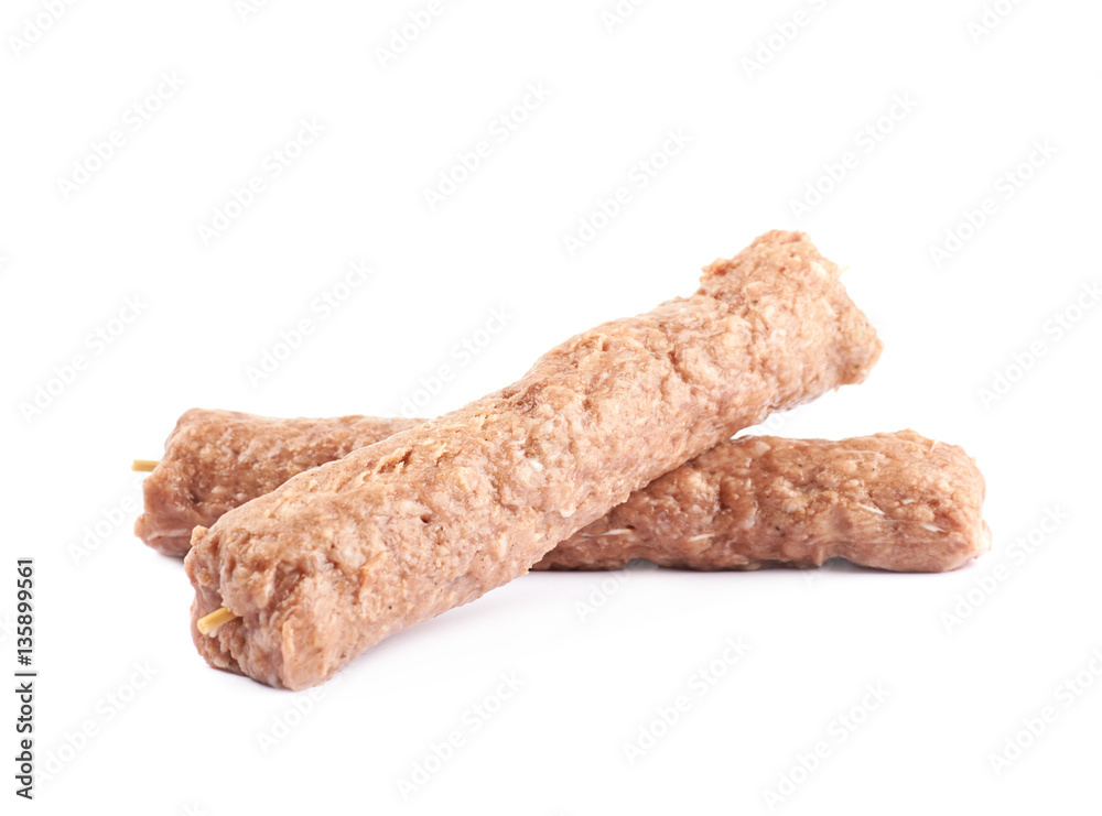 Raw kebab meat on a stick