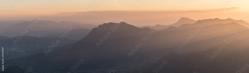Silhouette panorama of layer mountain in the morning, north of Thailand