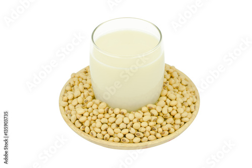 Milk with soy beans on white background.