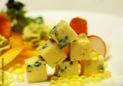 Diced cheese with blue mold photo