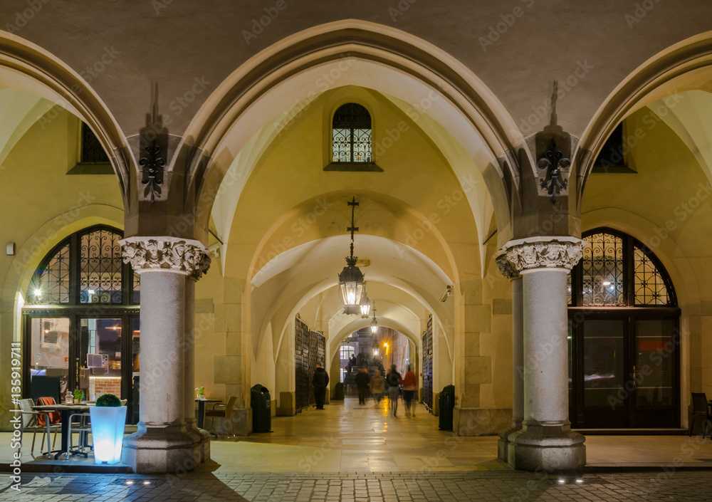 Gothic arcades of Cloth Hall on Main Market Square in Krakow by night