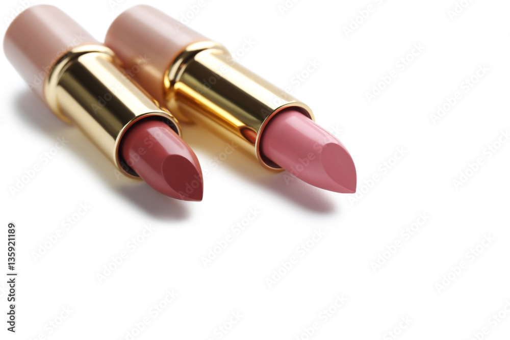 Obraz premium Colorful lipsticks isolated on a white