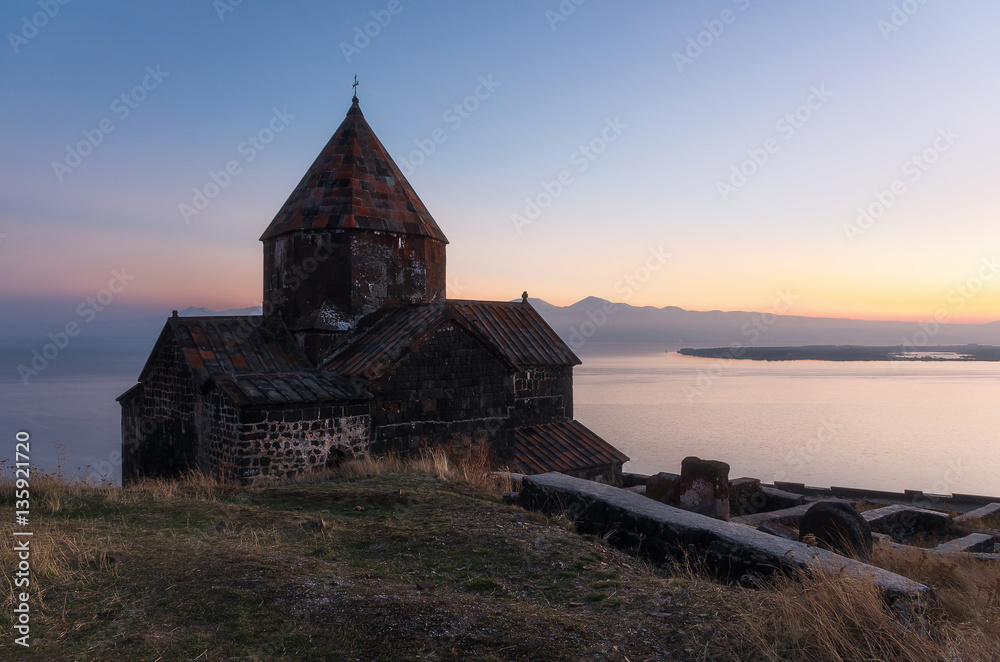Scenic view of an old Sevanavank church in Sevan at sunset
