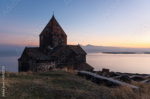 Scenic view of an old Sevanavank church in Sevan at sunset