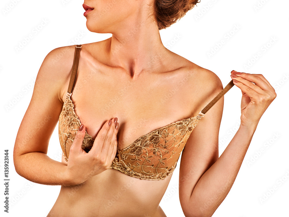 Breast self exam of women. Woman wear bra. Body part of girl with beautiful  breasts and