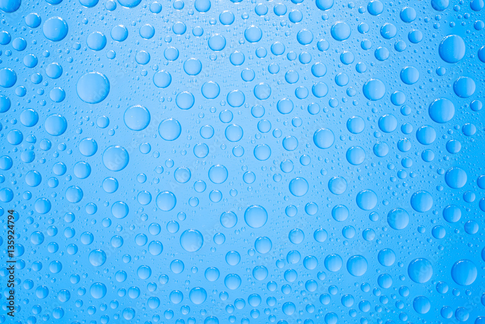 Water drops on blue background