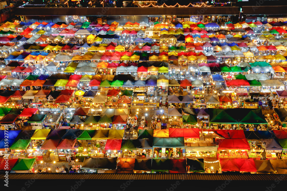 Multi-colored tents /Sales of second-hand, Train Night Market Ratchada, Bangkok, Thailand