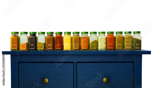Fototapeta Naklejka Na Ścianę i Meble -  Assorted ground spices in bottles on wood, Still life with spice