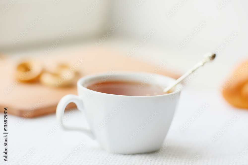 A cup of tea on a light background A cup of tea on a light background