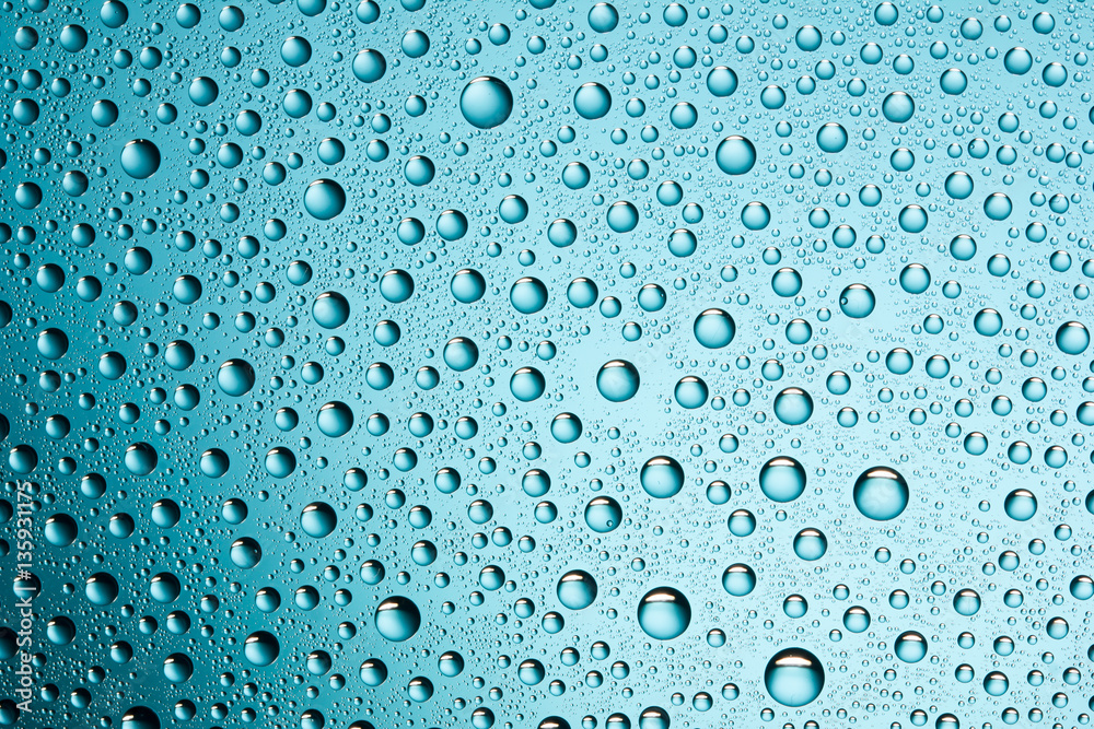 Water drops on glass surface texture.