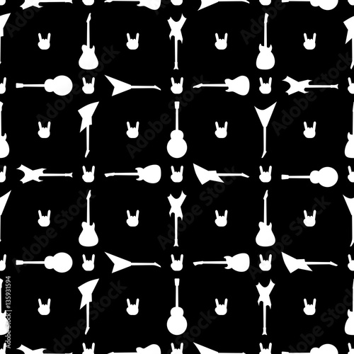 Rock and roll sign and electric guitars seamless pattern