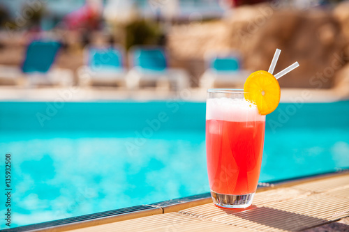 summer cocktail by pool. Delicious beverages