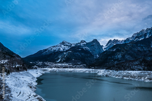 Dramatic winter landscape, mountain village in Trentino, Italy