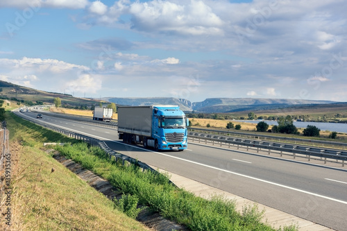 Blue truck on highway