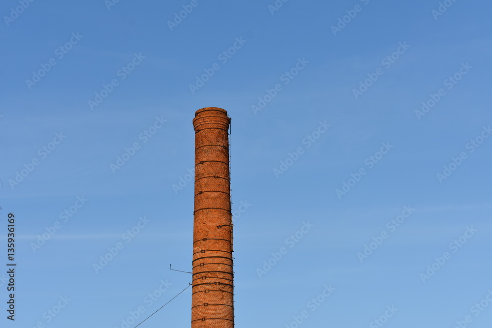 the brick chimney of boiler house of red brick